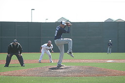 Pitcher About to Throw off of Brown Turf Portable Baseball Mound